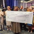 Livingstone College’s Class of 1973 raised more than $300,000 to support its alma mater and gifted an antique framed plate of the Price Building, which was presented to Livingstone President Dr. Anthony J. Davis.